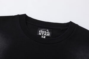 Close-up of the Hellstar Studios Brain Helmet T-Shirt black neck tag showing brand logo and premium cotton detail.