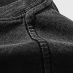 Close-up detail showing the high-quality premium soft cotton fabric texture of the Hellstar Studios Chrome Logo T-Shirt.