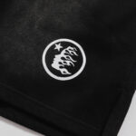 Black Hellstar Studios Classic Shorts featuring a detailed white circular emblem graphic print with star icon.