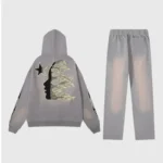 Hellstar Studios Flame Grey unisex cotton tracksuit set with flame-profile graphic hoodie and matching washed grey sweatpants