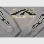 Hellstar Studios Flame Grey unisex cotton tracksuit with vintage washed effect and iconic branding graphic detail.