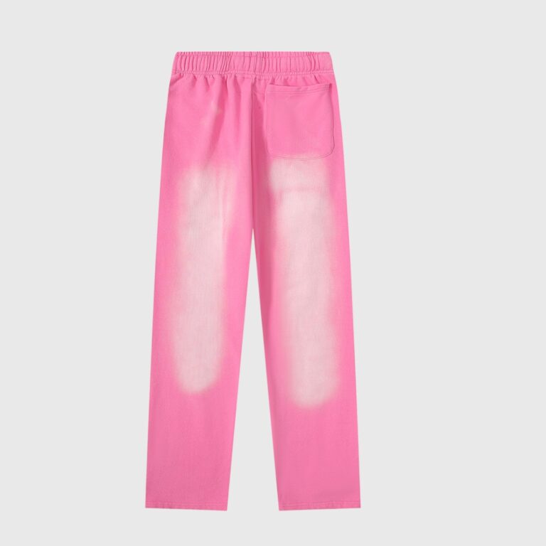 Back view of the Hellstar Studios Flame Sweatpants in a vibrant pink vintage-washed fleece fabric with a rear pocket.
