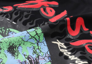Hellstar Studios Heaven on Earth black T-shirt graphic detail featuring red text and planet art print