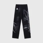 Hellstar Studios Path To Paradise black track pants featuring signature graphic prints and a comfortable drawstring waist.