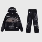 Hellstar Studios Path To Paradise black tracksuit featuring a graphic hoodie and matching drawstring pants set.