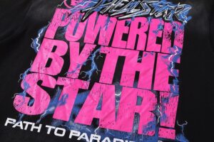 Black cotton Hellstar Studios Powered By The Star graphic t-shirt with vibrant pink and blue electric lightning design