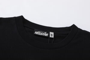 Close-up view of the black Hellstar Studios QR Christ T-shirt neck tag label on the garment interior collar.