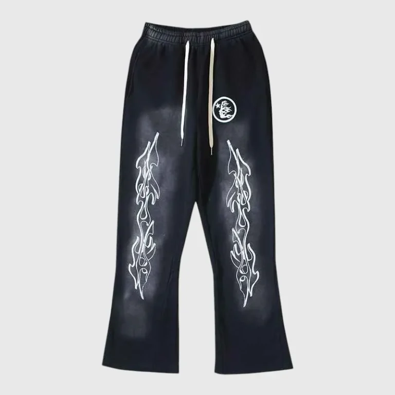 Hellstar Studios black vintage washed racer flare sweatpants with iconic white flame graphic print detailing.