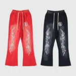 Hellstar racer flare sweatpants red and black with white flame panel graphics, drawstring waist and relaxed flare silhouette