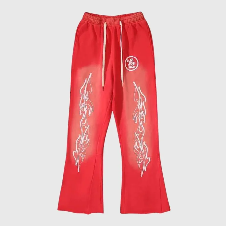 Hellstar Studios Racer Flare red sweatpants with white flame graphics, drawstring waist, side pockets, vintage washed fleece