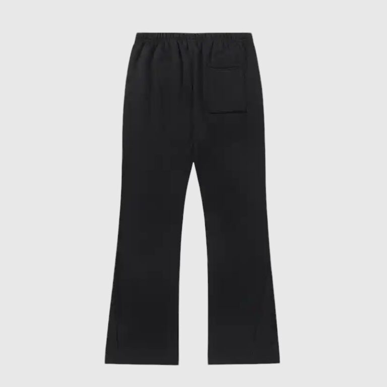 A back view of the black Hellstar Studios Racer sweatpants featuring a relaxed, flared leg design and drawstring waist.