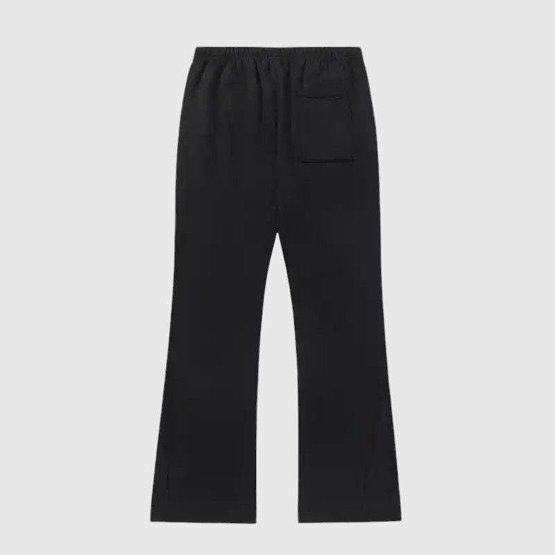A back view of the black Hellstar Studios Racer sweatpants featuring a relaxed, flared leg design and drawstring waist.