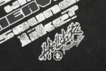 Close up view of the white graphic design printed on the back of the black Hellstar Studios Rage T-Shirt.