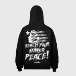 Back view of the black Hellstar Studios Reach Your Inner Peace hooded sweatshirt with graphic print