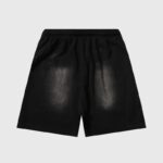 Back view of the Hellstar Studios Records black shorts with a vintage washed finish and elasticized waistband.