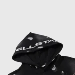 Detail view of the Hellstar Studios Records black tracksuit hoodie featuring signature branding on the hood.