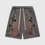 Vintage brown Hellstar Studios Records shorts with screen-printed graphic designs and an adjustable drawstring.
