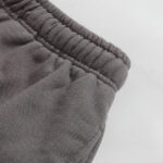 Close-up view of the elastic waistband and premium grey fleece fabric on Hellstar Studios Records vintage shorts.