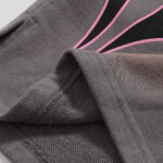 Close-up view of the premium grey fleece fabric and high-density screen print detail on Hellstar Studios Records Shorts.