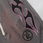 Close-up view of the grey Hellstar Studios Records shorts featuring signature distressed star graphics and logo print.