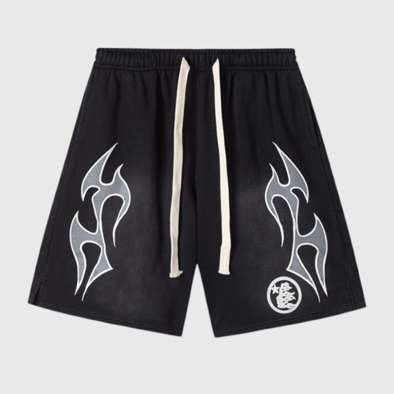 Hellstar Studios Records black shorts with flame graphics and drawstring waist in a vintage washed streetwear style.