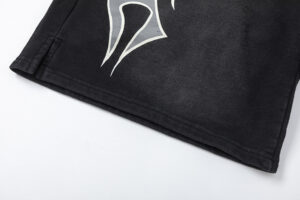 Hellstar Studios Records black shorts featuring premium distressed star graphic detail and a vintage wash finish.