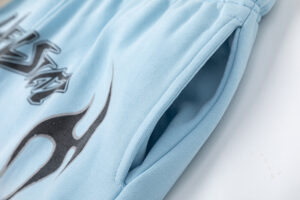 Light blue Hellstar Studios Records shorts featuring a deep side pocket and high-density screen-printed graphic art.