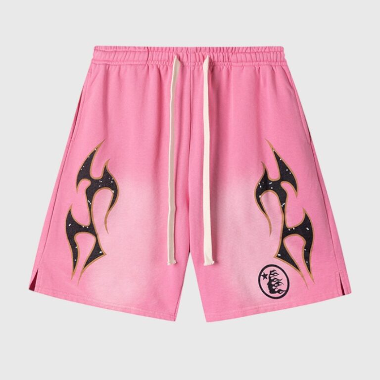 Pink Hellstar Studios Records shorts featuring vintage washed fabric, black flame graphic prints, and drawstring waist.
