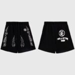 Front and back view of Hellstar Studios Records black vintage shorts featuring graphic star and flame screen prints.