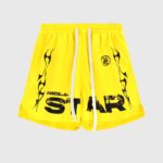 Bright yellow Hellstar Studios Records Star shorts with black graphic screen print designs and white drawstring waist.