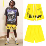 Hellstar Studios Records Star Shorts in yellow featuring signature star graphic print and drawstring waistband.