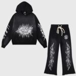 Hellstar Studios Records vintage black tracksuit featuring a hooded sweatshirt and matching pants with flame graphics.