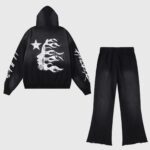 Hellstar Studios Records vintage black cotton tracksuit featuring a graphic hoodie and matching pants with flames.