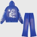 Back view of the Hellstar Studios Records Yoga Tracksuit in blue, featuring a white star and flame graphic design.