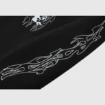 Black Hellstar Studios Sketch Hoodie featuring detailed white flame graphic art on the fabric for streetwear style.