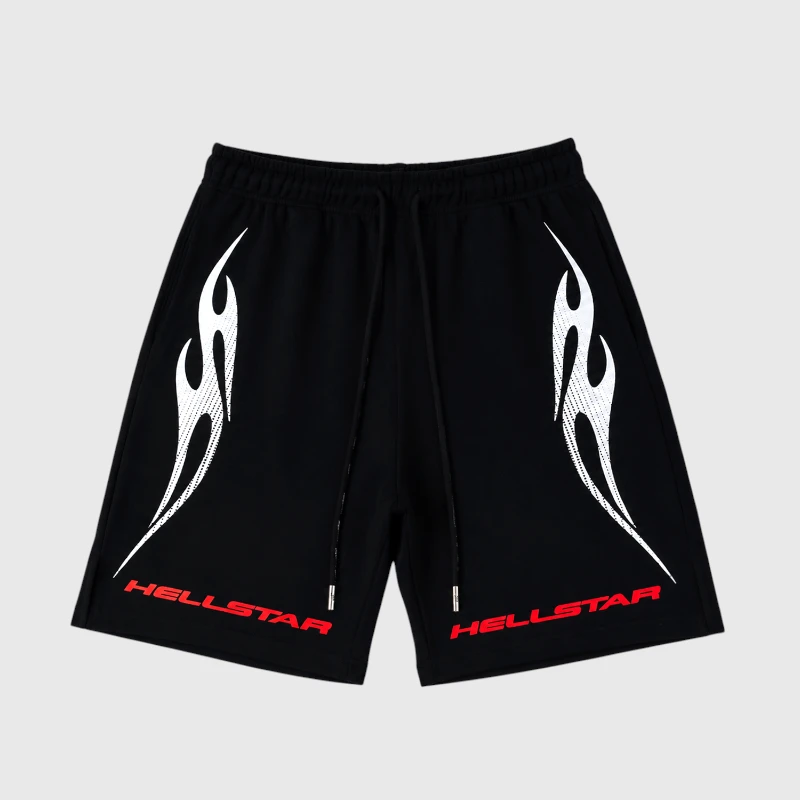 Hellstar Studios Sports Flame Shorts Front View Black Hellstar Studios athletic shorts featuring white flame graphics and red Hellstar logo branding on the legs.