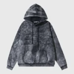 Hellstar Studios washed grey vintage-style hooded sweatshirt with iconic black logo graphic and drawstring details.