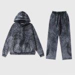 Hellstar Studios washed grey tracksuit featuring a vintage graphic hoodie and matching joggers in a relaxed fit.