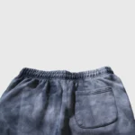 Back view of the Hellstar Studios washed grey tracksuit sweatpants featuring a premium vintage-inspired fabric finish.