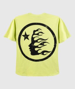 Hellstar Studios yellow short sleeve unisex t-shirt featuring a black circular graphic print with a flame face logo.