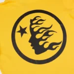 Yellow Hellstar Studios zipper sweater featuring a black circular graphic on the back with a star and fire silhouette.