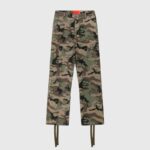 Hellstar Supreme Cargo Camo Pants featuring durable utility design with adjustable cuffs and classic camouflage print.