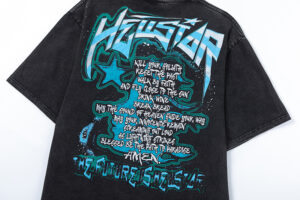 Back view of the Hellstar The Future Iconic vintage washed black t-shirt featuring bold blue graphic text design.