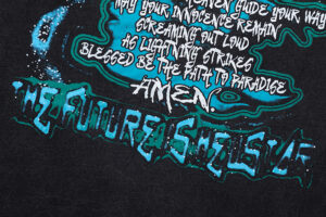 Detailed close-up of the graphic screen print on a black Hellstar The Future Iconic T-shirt featuring stylized blue text.
