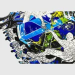 Close up of the Hellstar The World Will Be Yours graphic print on a premium 100% cotton unisex vintage washed T-shirt.