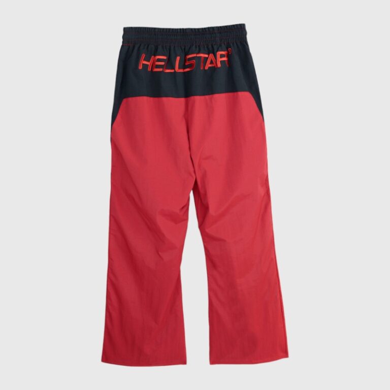Back view of Hellstar Thriller red and black color-blocked track pants with an embroidered logo on the waistband.
