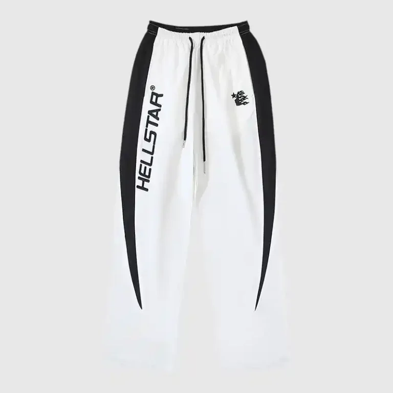 Front view of the Hellstar Thriller white track pants with a bold black side stripe and embroidered logo detailing.