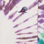 Close-up view of the unique purple and white tie-dye pattern on a premium Hellstar hoodie with signature logo detail.