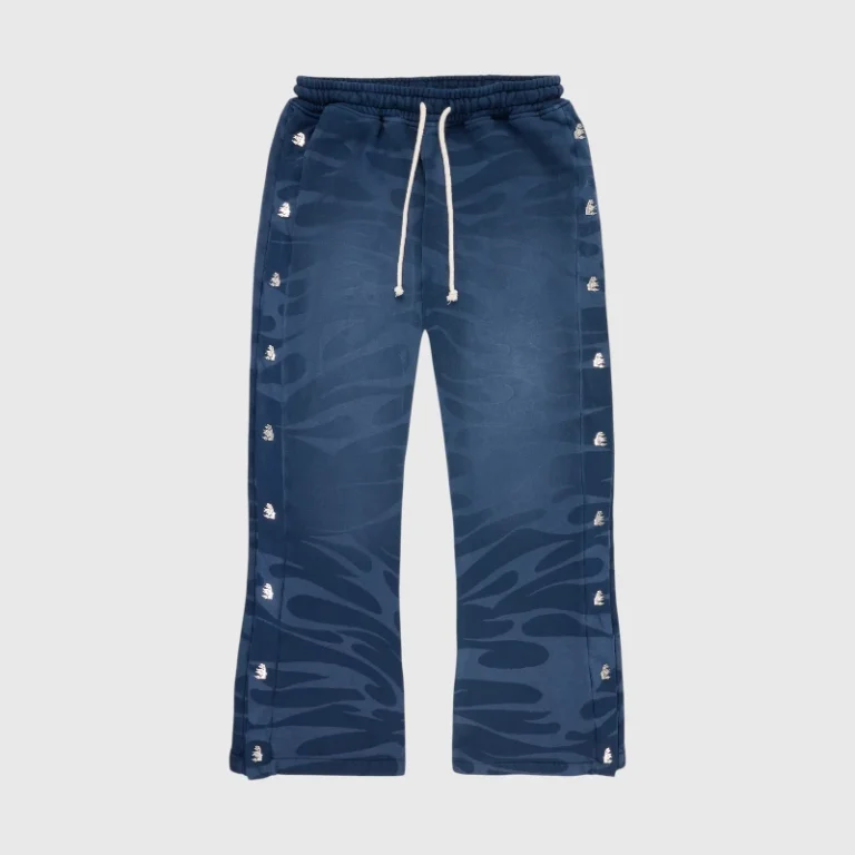 Blue Hellstar Tribal Mirror Face sweatpants featuring a relaxed fit, heavyweight cotton fleece, and adjustable drawstrings.