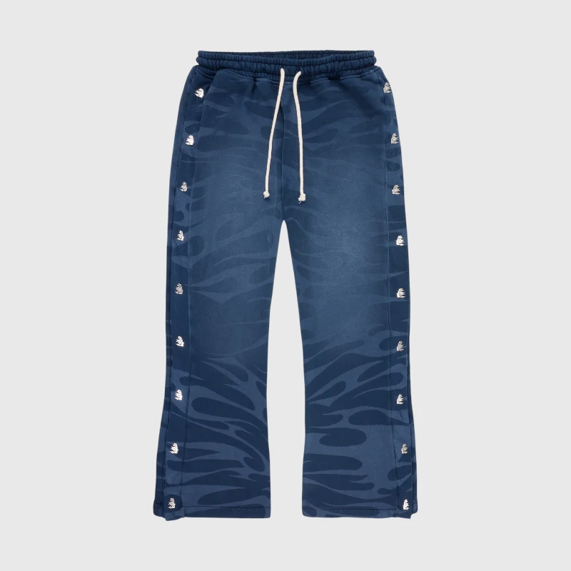 Hellstar Tribal Mirror Face Blue Sweatpants Blue Hellstar Tribal Mirror Face sweatpants featuring a relaxed fit, heavyweight cotton fleece, and adjustable drawstrings.